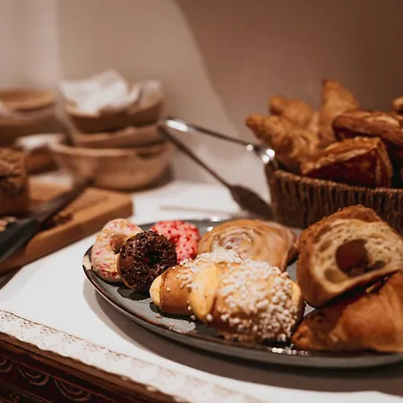 Aster Boutique & フューゲンベルク